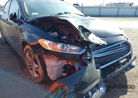 2016 Ford Fusion Energi Titanium from USA, damaged, VIN 3FA6P0SU8GR157619